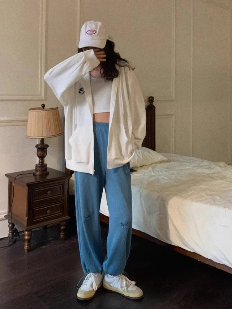 Boho Chic Trousers: Flared Elegance with a Bow Detail, Effortlessly Stylish for the Season!
